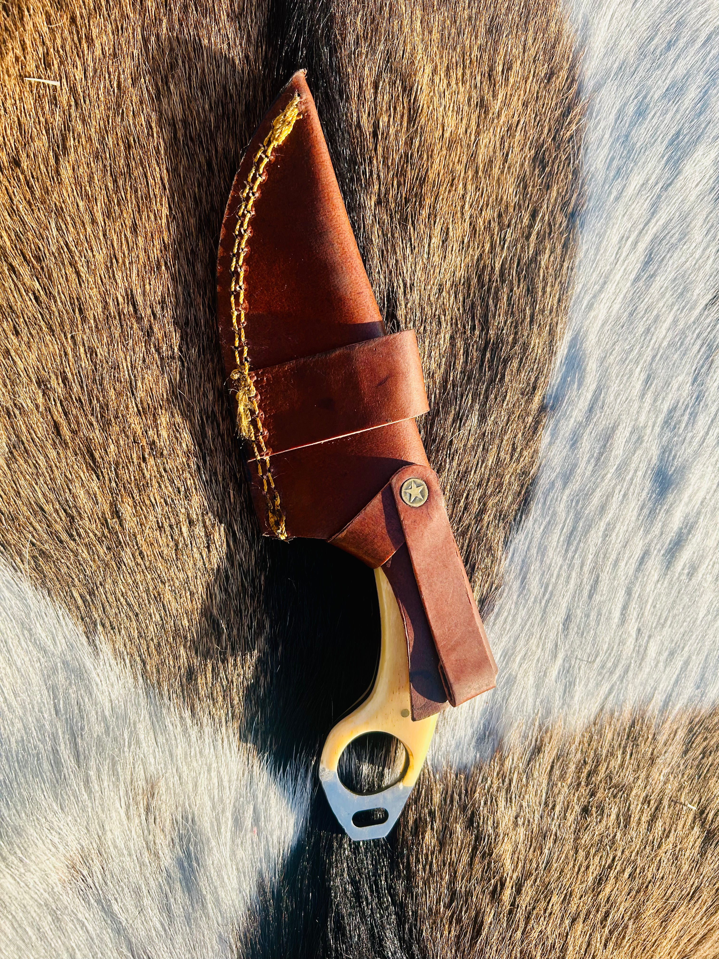 Knife and sheath photographed for protection from moisture and sunlight