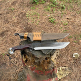 Outdoor kukri knife on log bushcraft and survival gear display