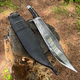 11 inch hand-forged bowie knife in wooden log