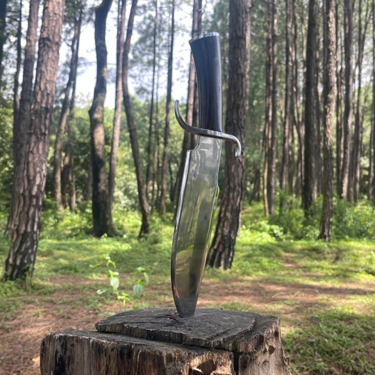 Bowie knife used for outdoor adventure and camping
