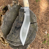 Side angle shot of 8‑inch Chukukri with full‑tang handle and polished spine