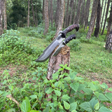 bajyu handmade machete and small machete stucked in wooden log used for easy and heavy task like camping, chopping woods.