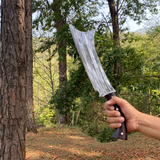 Man holding traditional handmade cleaver knife from Nepal