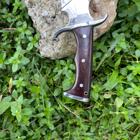 Rosewood handle of Tikau Kukri knife with full tang construction for secure grip