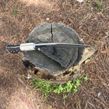 Ready-to-use Chukukri on wood block for bushcraft and outdoor carving