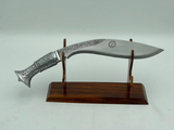A 12 inch hand forged kukri with a polished blade