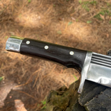 well textured shaped strong handle of bowie knife