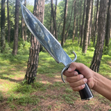 Man holding Authentic Nepalese khukuri with sharp curved blade
