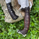Handle of bajyu handmade machete and small machete used for easy and heavy task like camping, chopping woods.