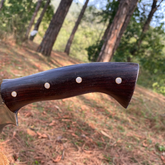 Traditional handmade cleaver knife from Nepal wooden handle closeup look