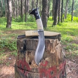 Side angle shot of 8‑inch Chukukri with full‑tang handle and polished spine