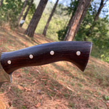 Traditional handmade cleaver knife from Nepal wooden handle closeup look