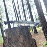 Knife on a tree stump in a forest setting