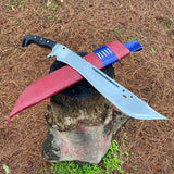 Machete knife with red leather sheath and blue accent on a tree stump outdoors for camping and protection