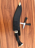 Black kukri knife with sheath on a wooden surface