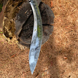 Closeup of Salyani kukri blade curve and polished finish with desorative design pattern